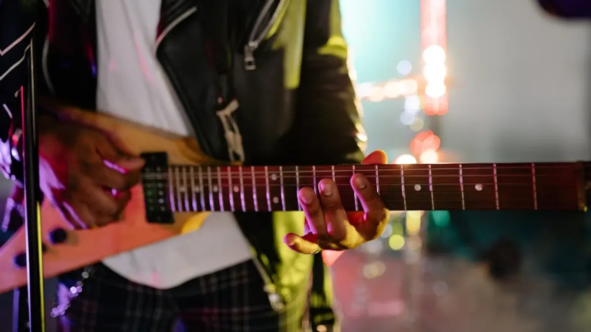 A man playing electric guitar.